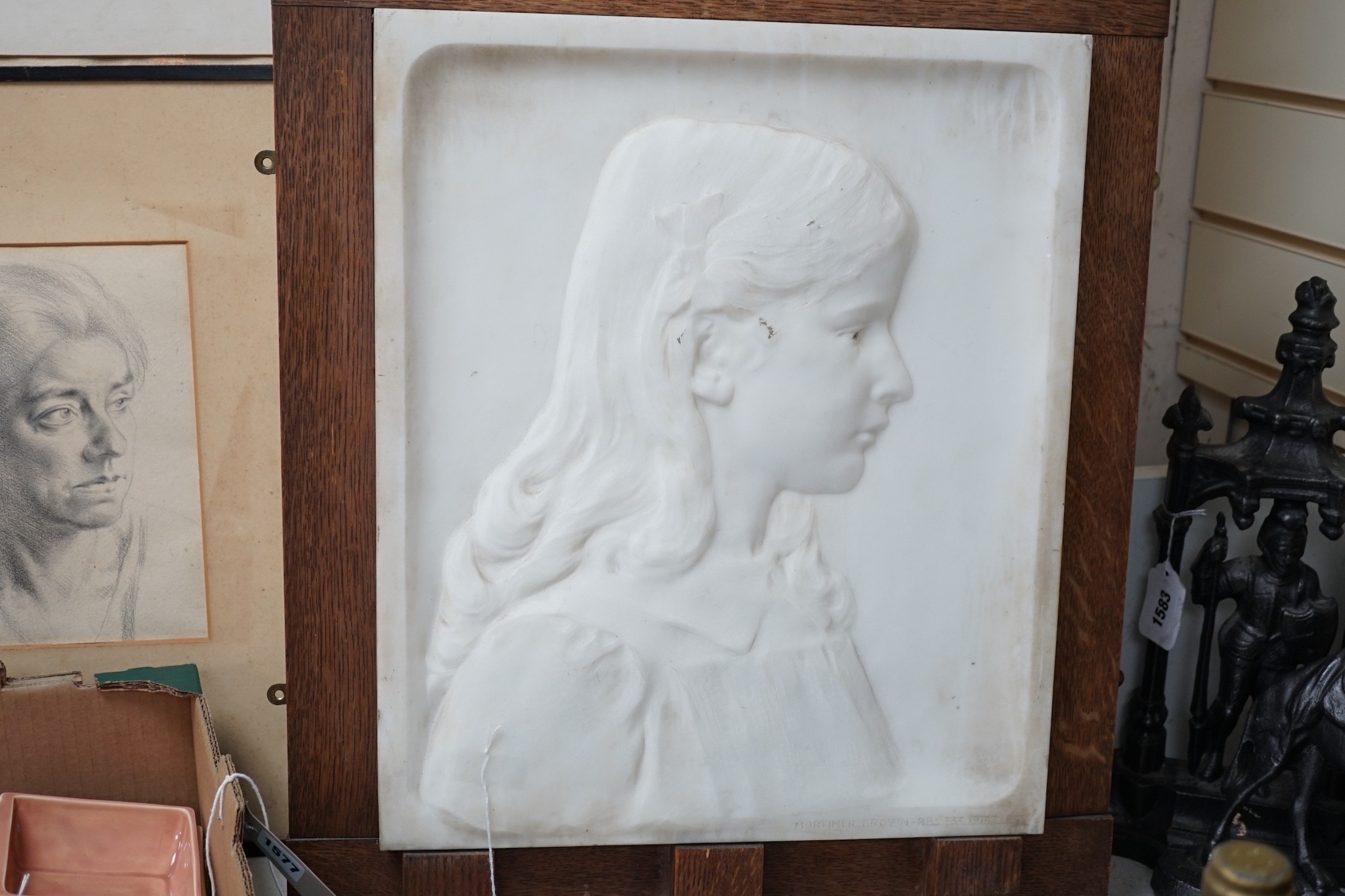 Mortimer Brown (1874-1966) RBS-Sc. 1914. A marble relief of a girl in oak frame, 46 x 38cm excl frame